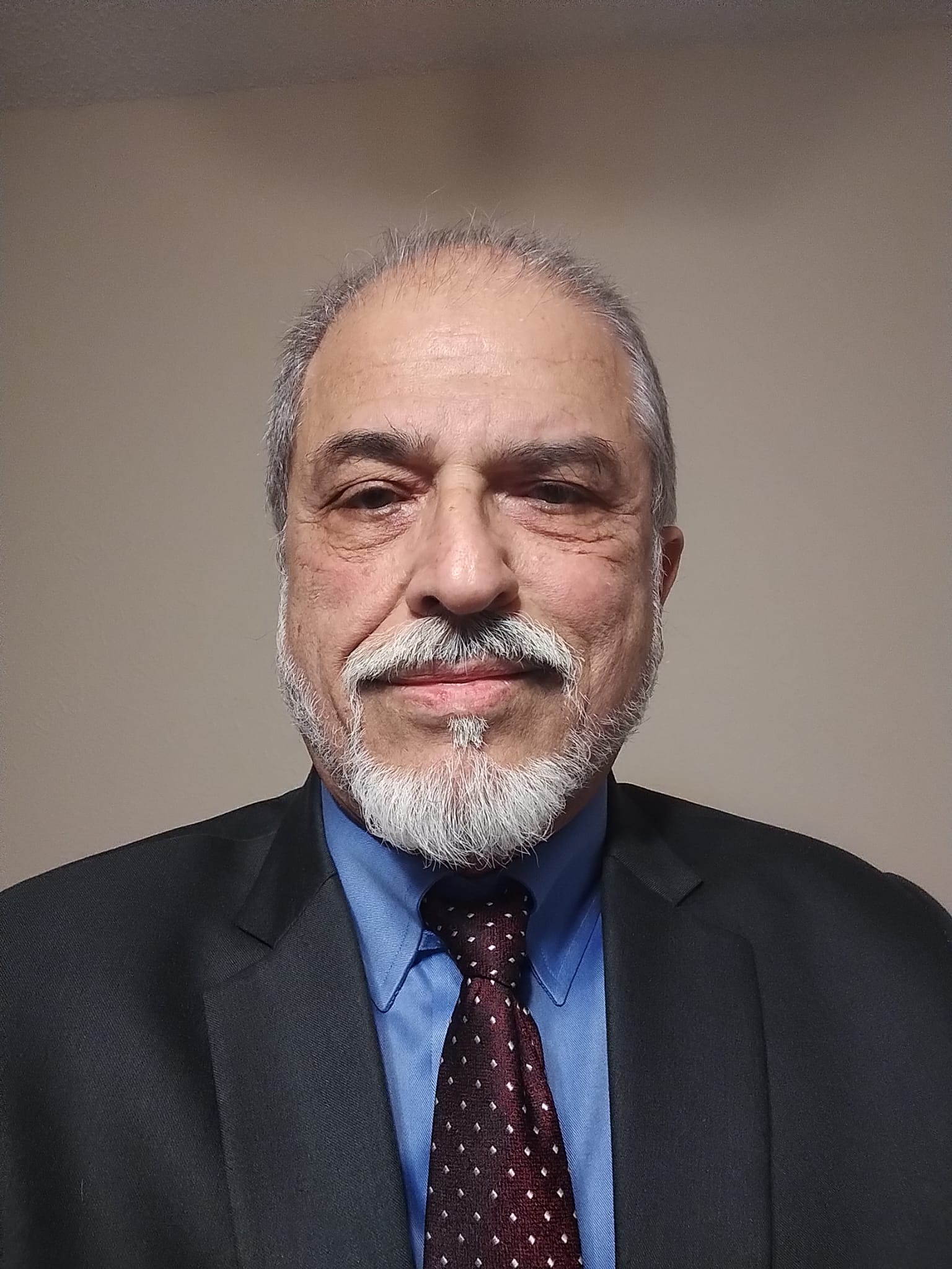 Hanif Akhawala - Director of Finance